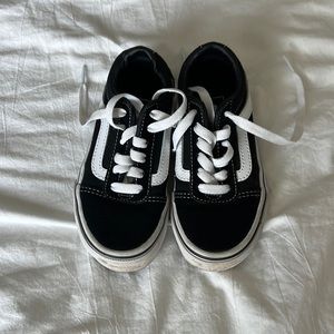 Black and white youth Vans